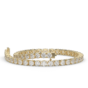 6 Carat Yellow Gold Round Shape Diamond Tennis Bracelet With Prong Setting.